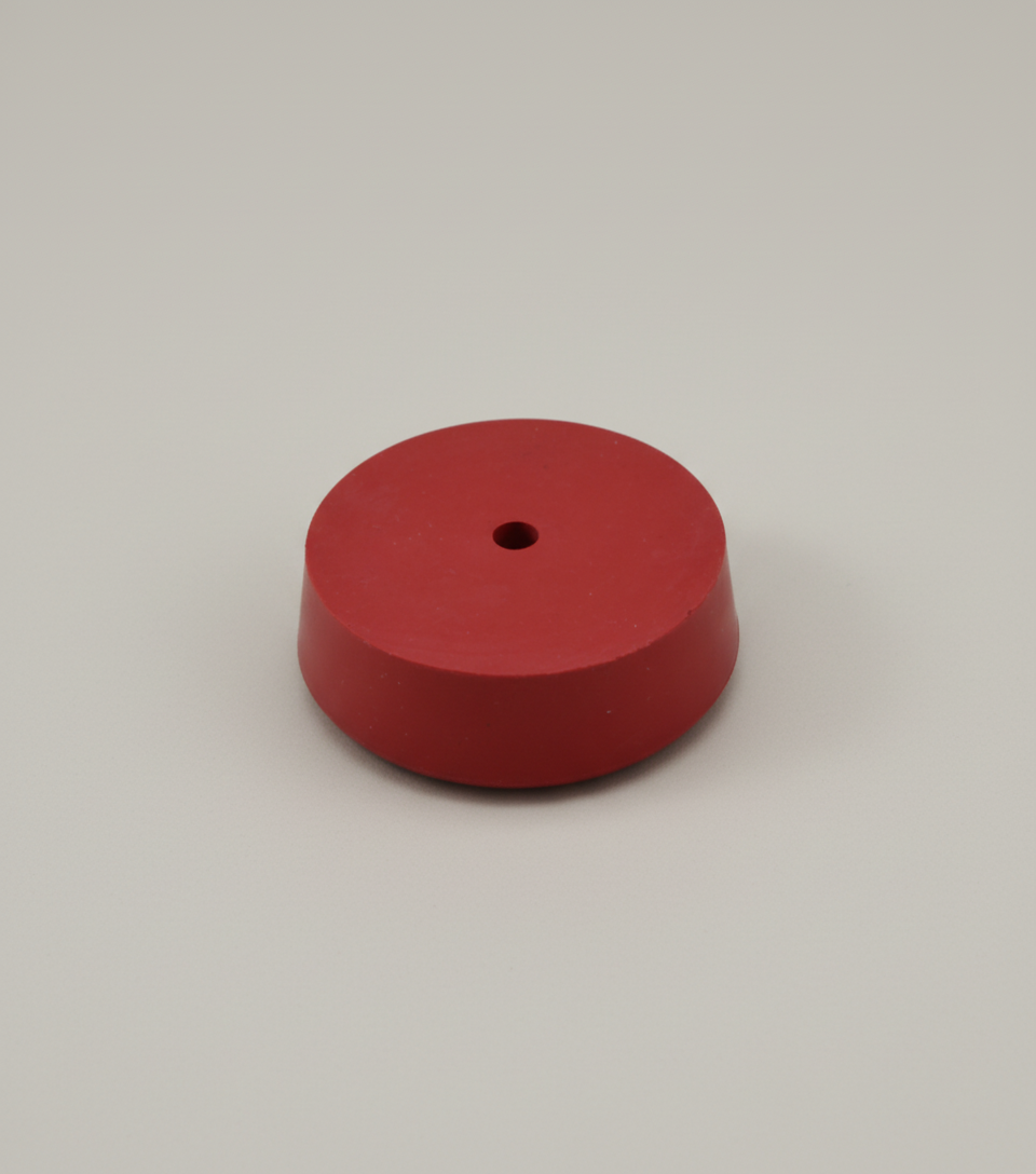 Rubber tuning fork activator with center storage hole