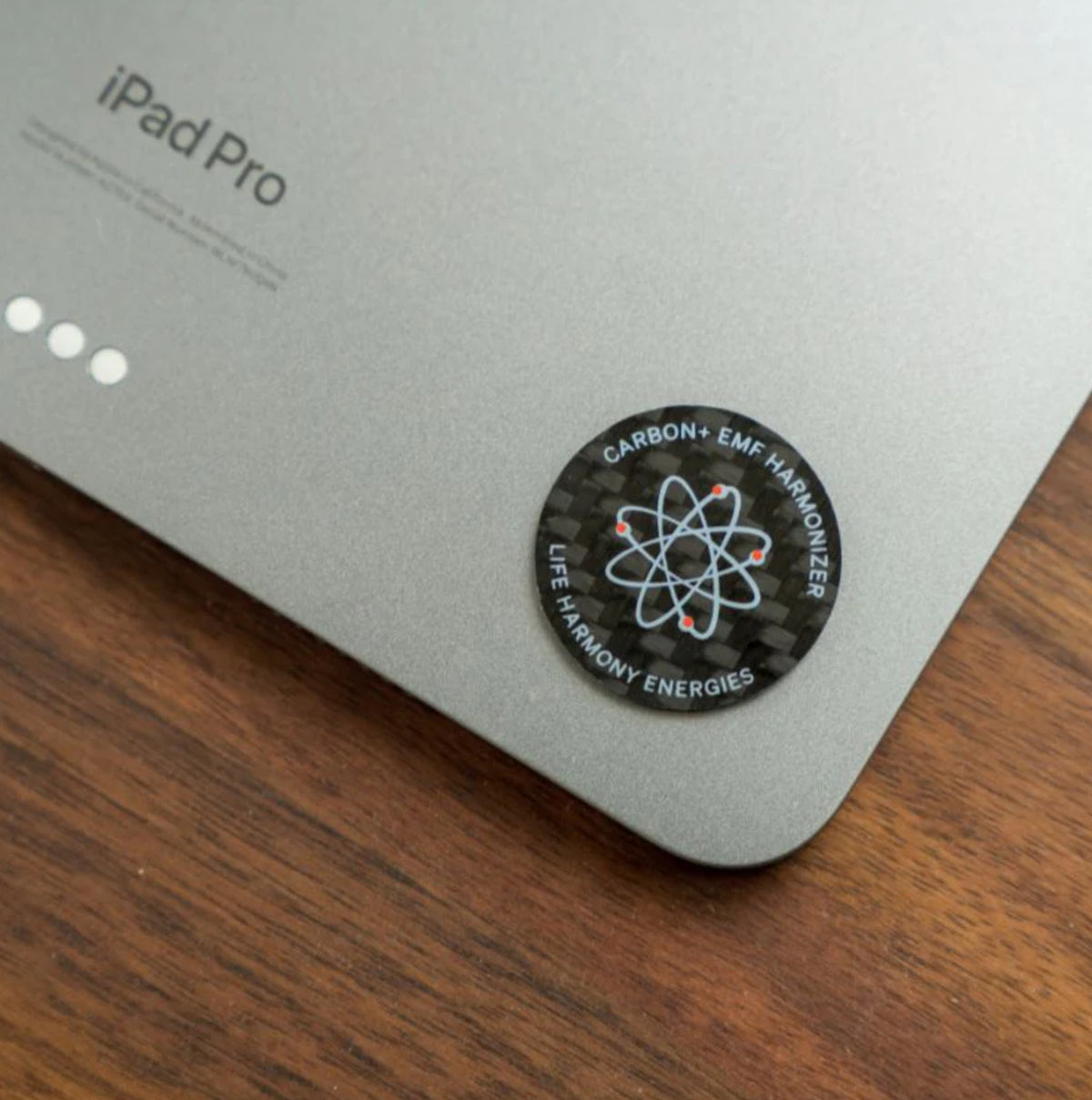 Life Harmony Energies Carbon+ EMF Harmonizer Chip — in use