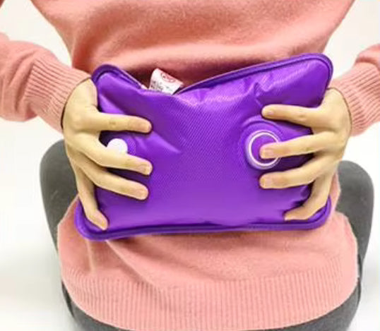 Electric hot water bottle on couch lifestyle