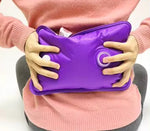 Electric hot water bottle on couch lifestyle
