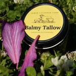 Lemon Lavender Tallow Balm jar closed, yellow lamb label framed by purple petals and clover