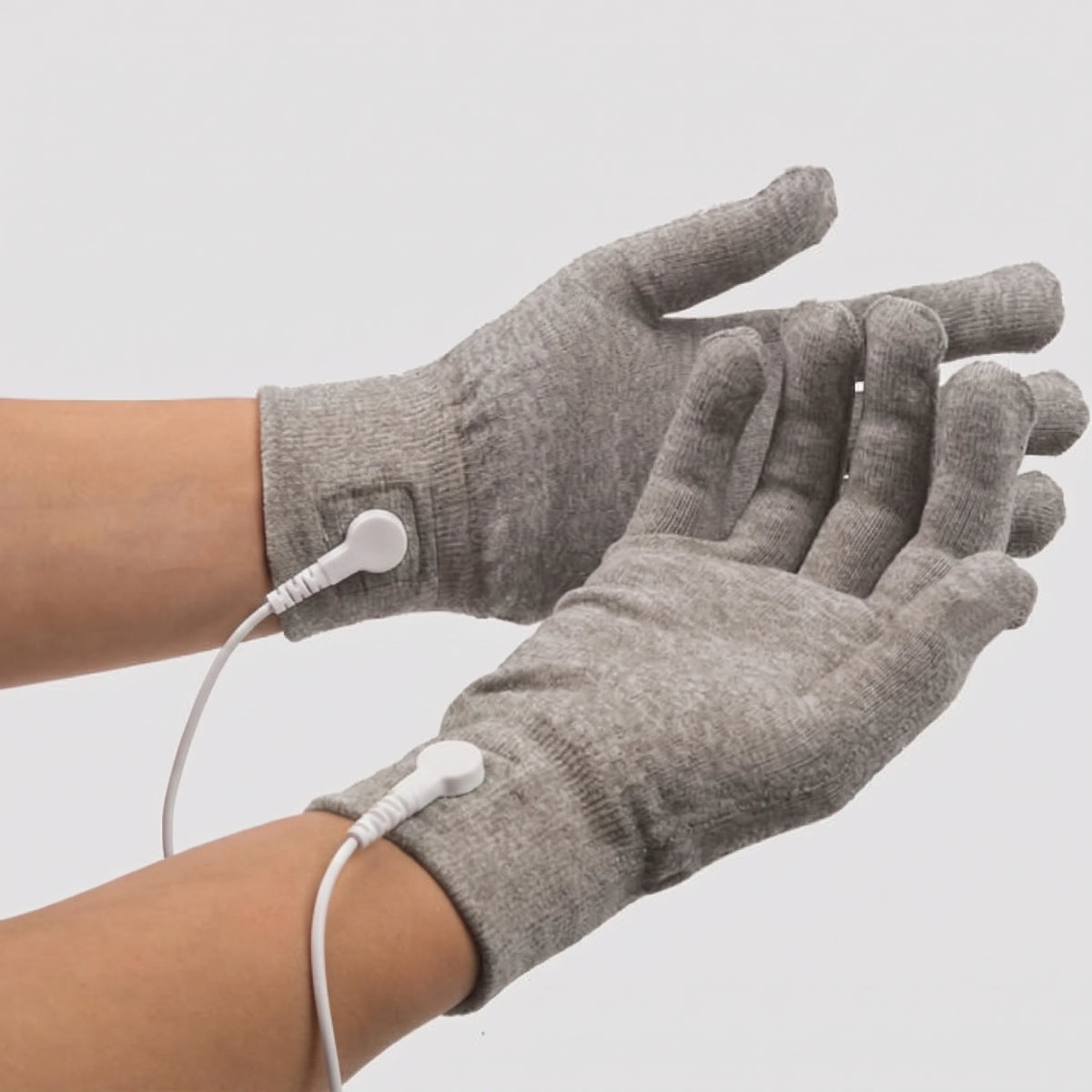 NEURO BUILDER CONDUCTIVE GARMENT GLOVES (ONE PAIR) | I would like the same image with one edit: please make the black wires pictures white.