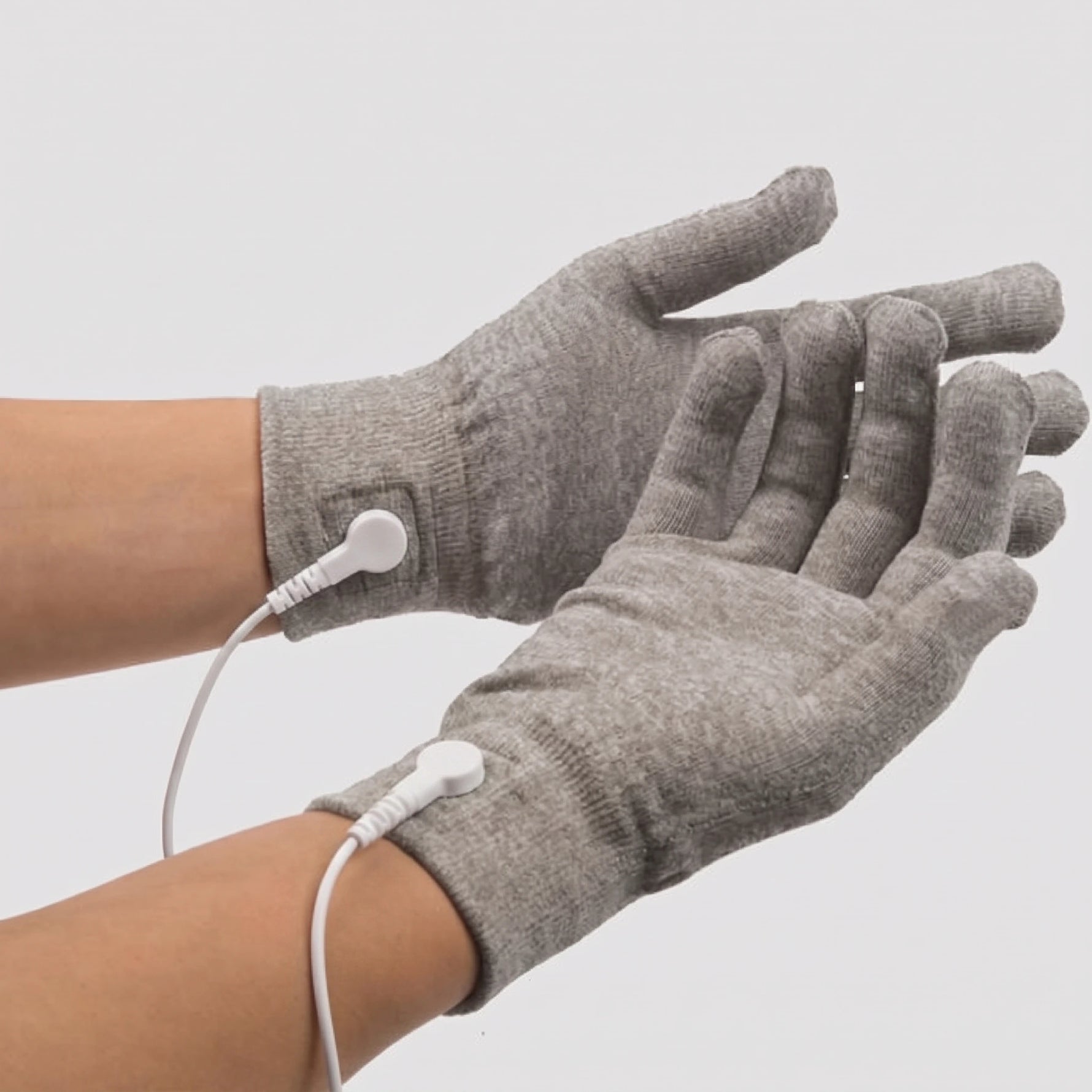 NEURO BUILDER CONDUCTIVE GARMENT GLOVES (ONE PAIR) | I would like the same image with one edit: please make the black wires pictures white.
