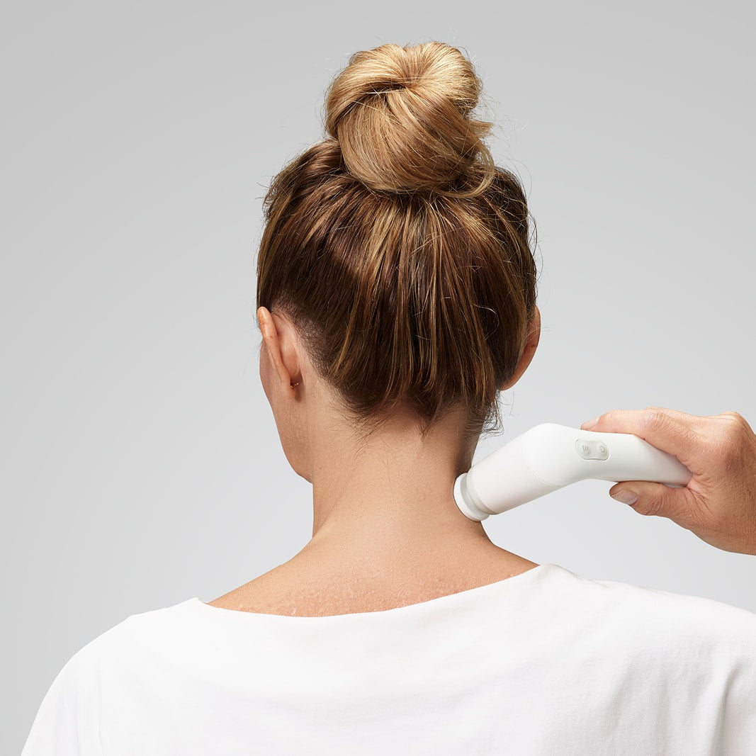 NOVAFON One local vibration & sound wave therapy device — in use