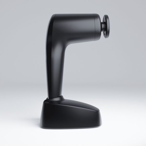 NOVAFON max+ sound wave device with disc attachment, shown from the side in its charging station