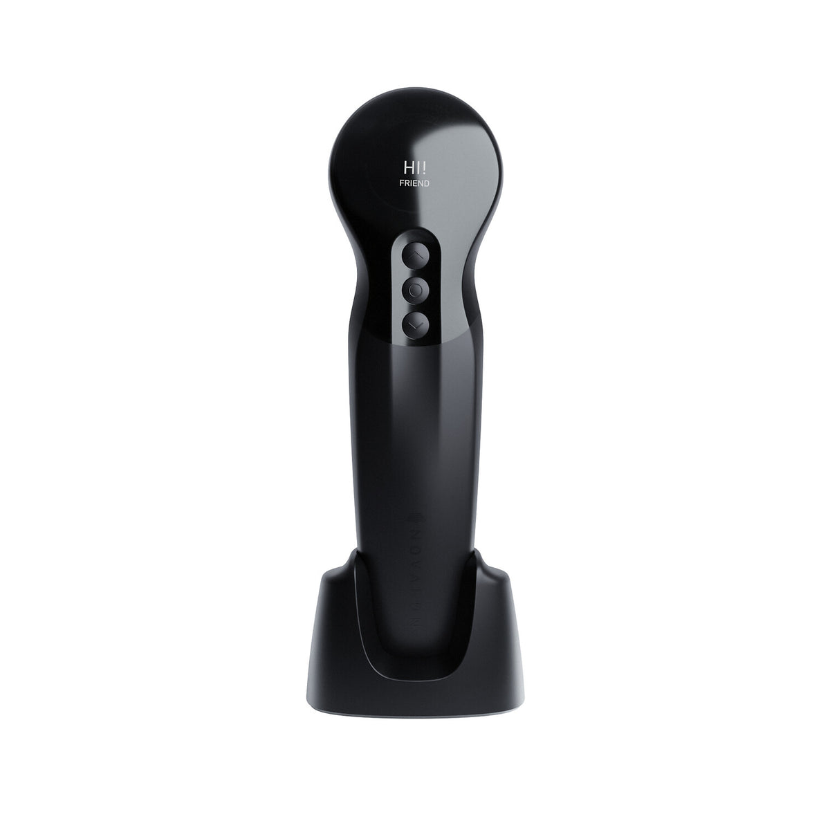 NOVAFON Max vibration therapy device resting in its charging station, display reading HI! FRIEND