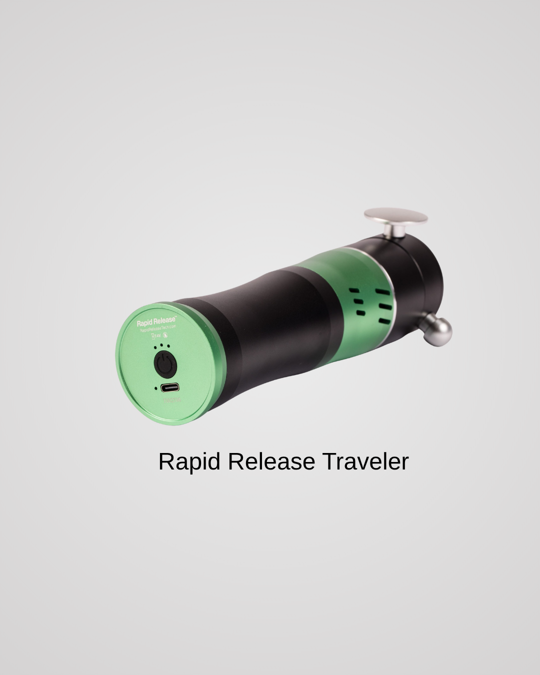Rapid Release Traveler portable vibration therapy device in black and green with disc and ball applicators