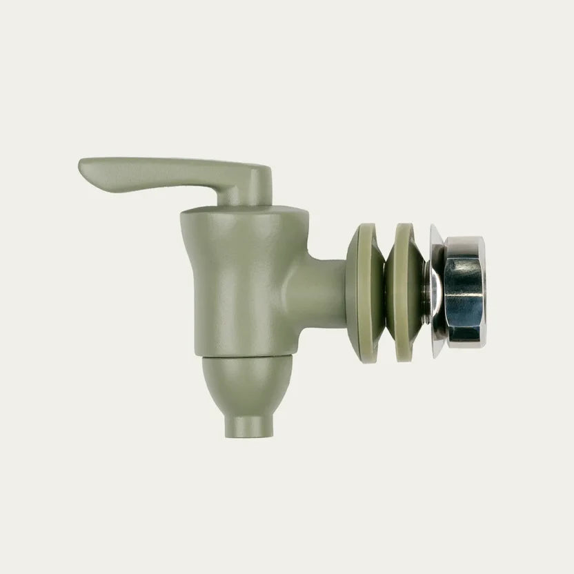 Green replacement spigot with lever handle, washers and mounting nut for a gravity water filter