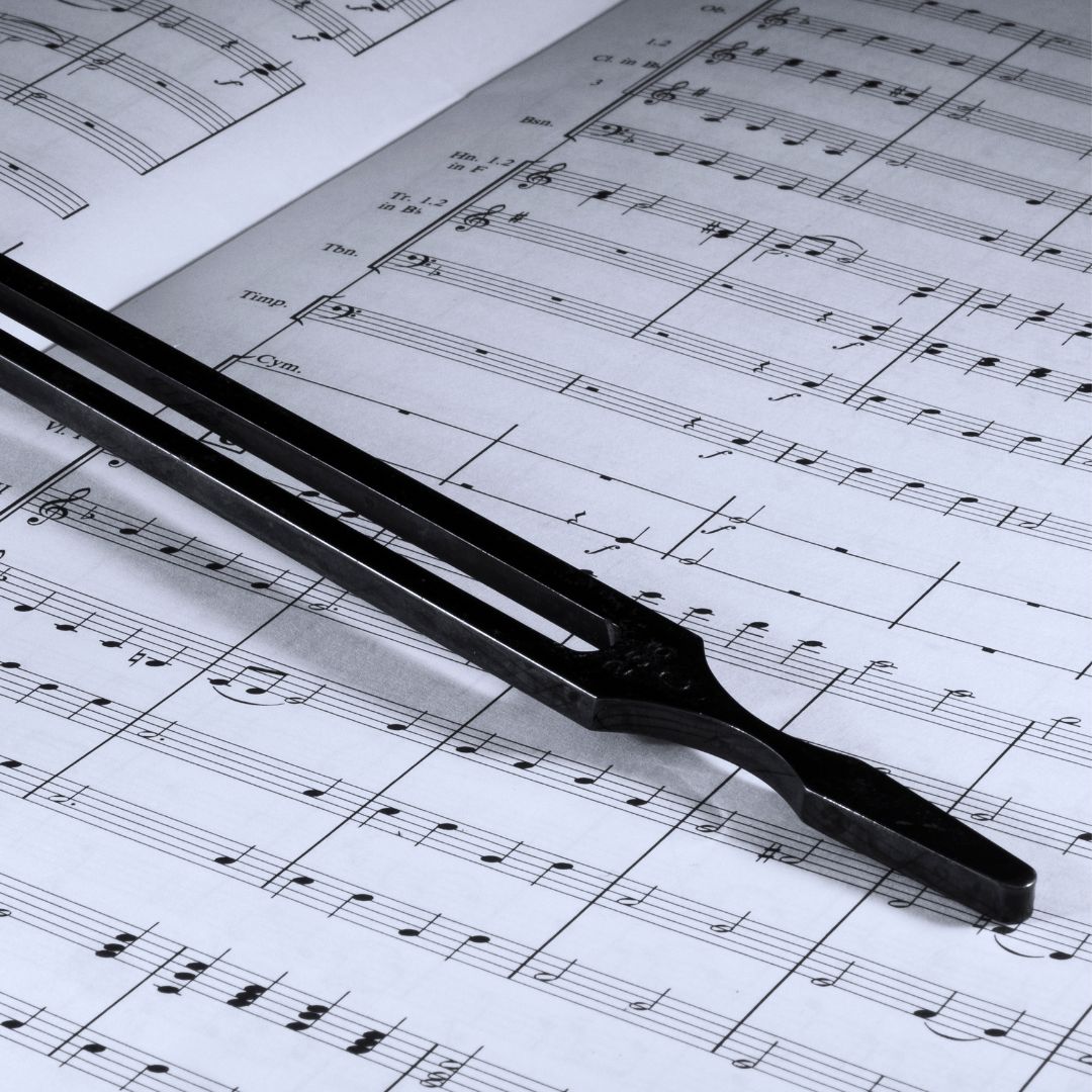 tuning fork on sheet music